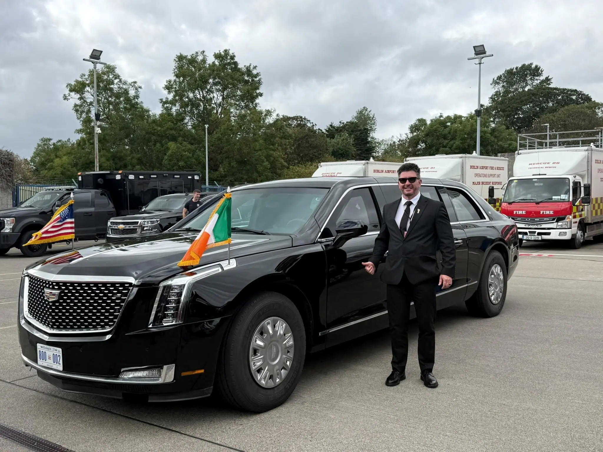 Catalin beside the US Presidential state car, flying the Irish and American flags