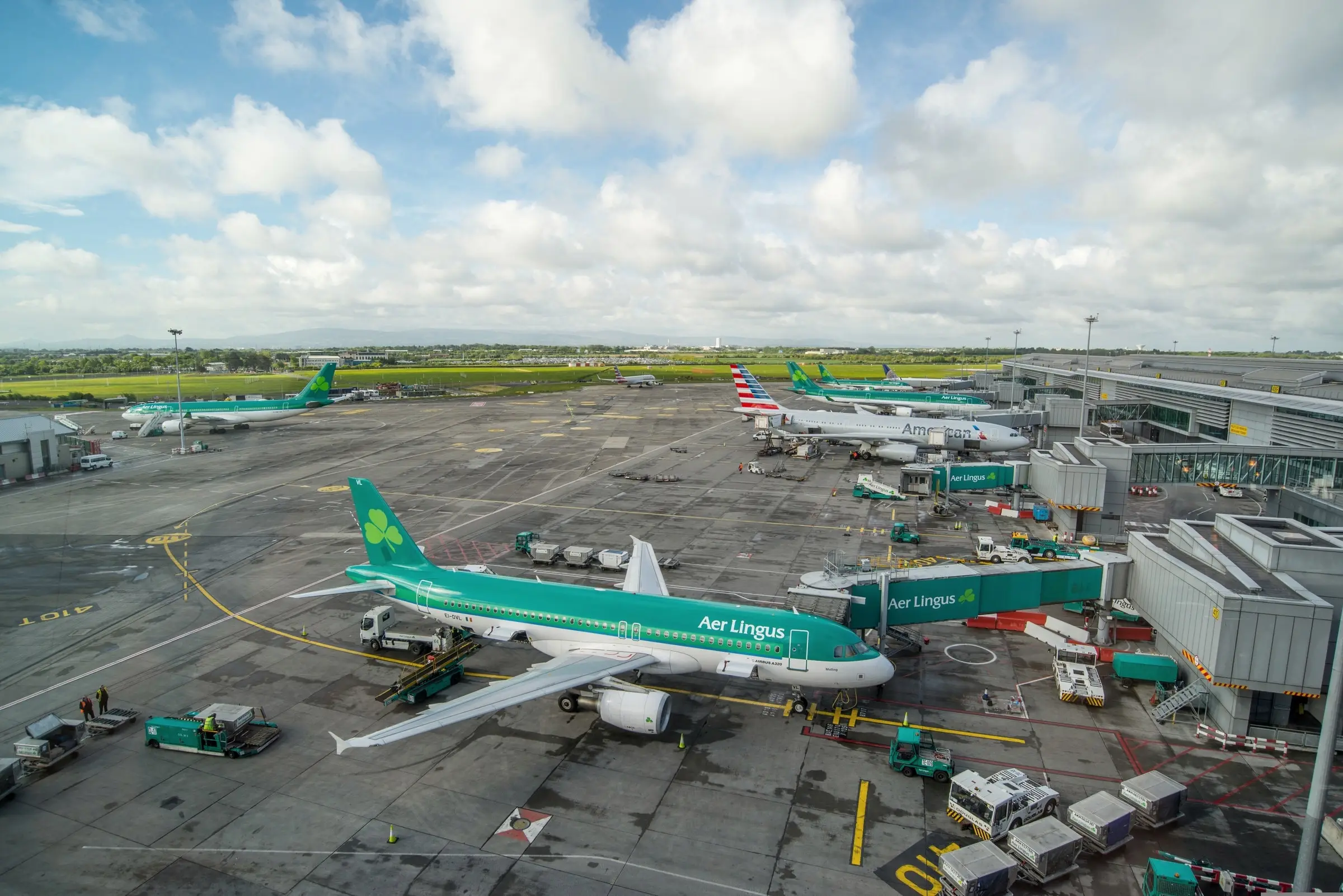 Aer Lingus and American Airlines aircraft at the gates of Dublin Airport